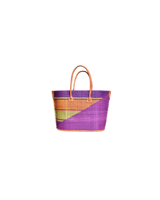 Front View:
“Handmade medium raffia handbag from Madagascar with a deep purple diagonal base and vibrant horizontal stripes in orange, plum, and green, finished with leather handles and reinforced corners.”