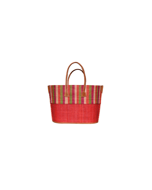 Front view: “Medium raffia handbag with red base and multicolor vertical stripes in green, pink, and red, handmade in Madagascar with leather handles.”