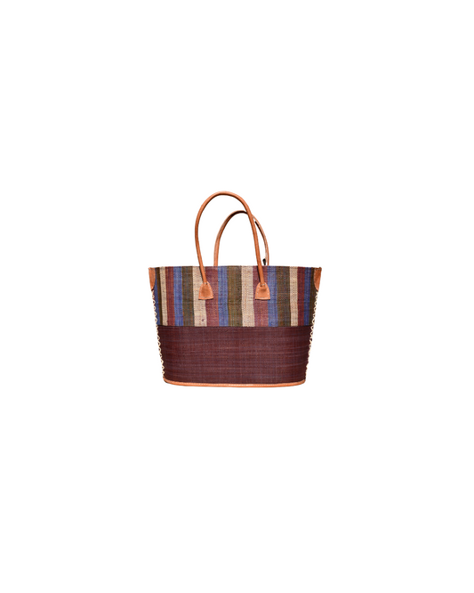 "Medium raffia handbag with multicolor vertical stripes in blue, beige, and plum on top and a solid brown base, featuring leather handles and corners."