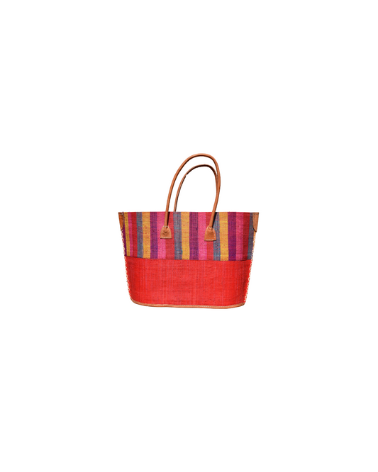 Front View: Medium Beach Bliss 120 raffia handbag with multicolor vertical stripes in pink, yellow, orange, and grey, paired with a solid red bottom panel. Features genuine leather handles and reinforced leather corners.
