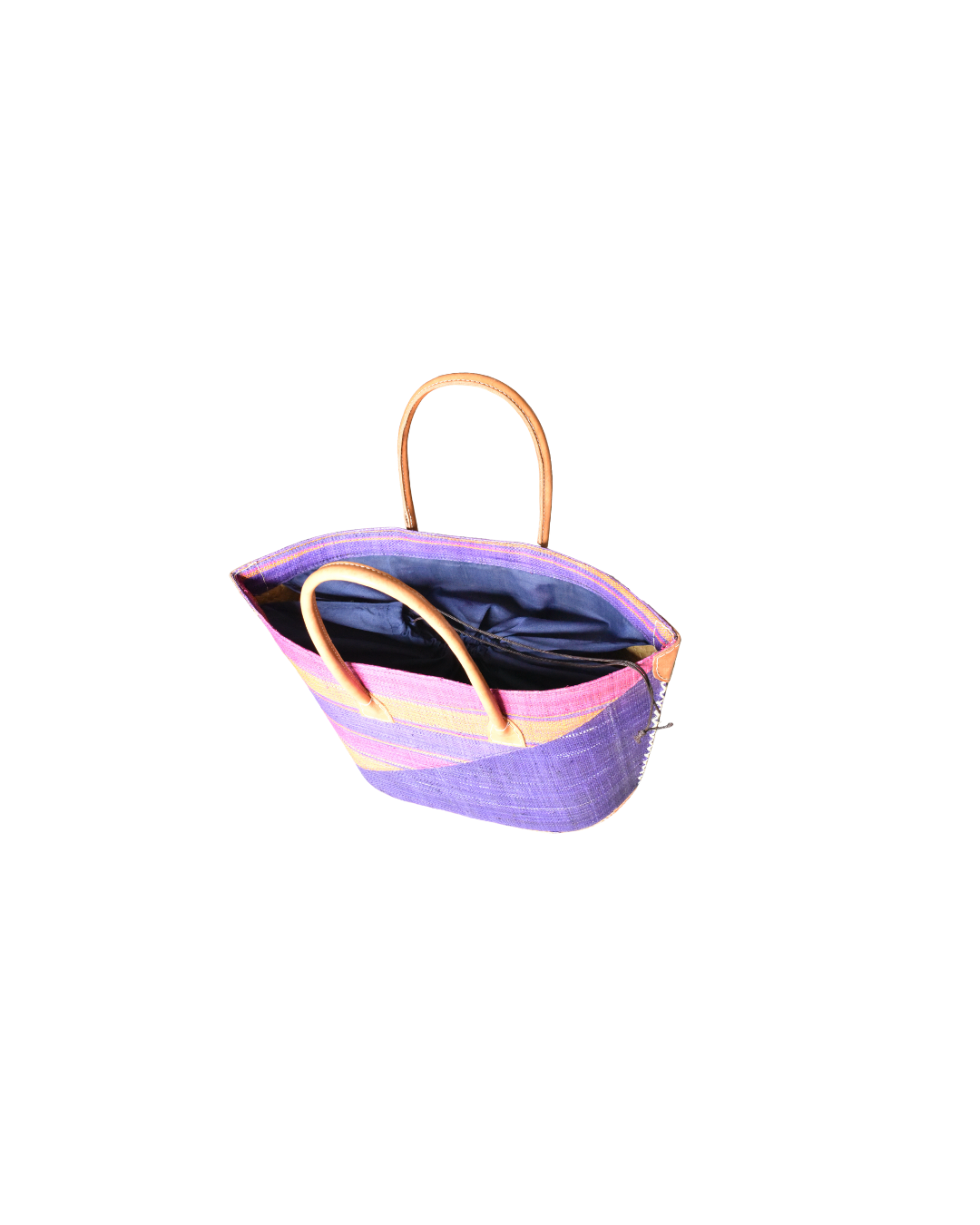 Top view of handmade raffia tote with drawstring securely closed, showcasing leather handles.