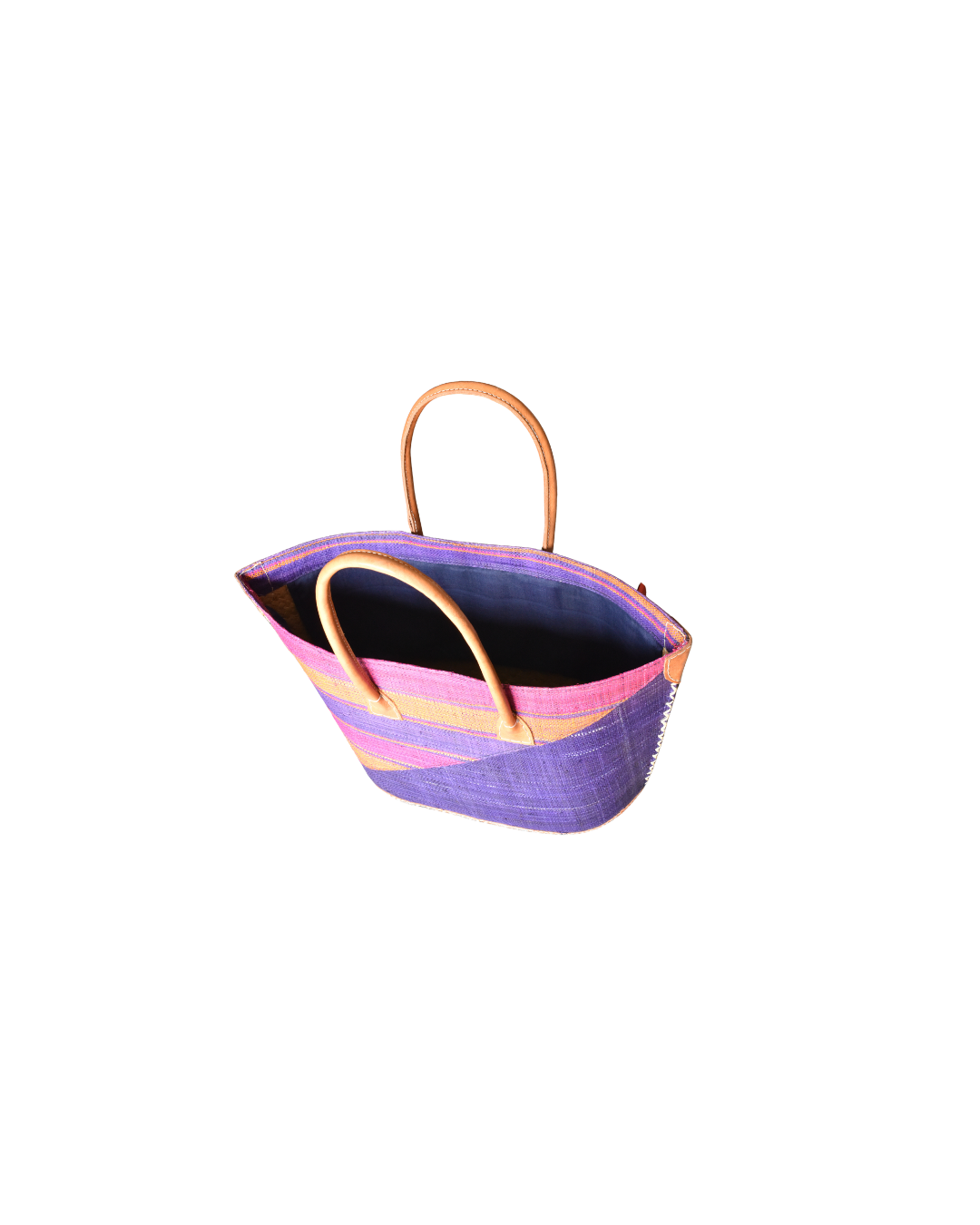 Top view of raffia tote showing fabric lining and open drawstring closure.